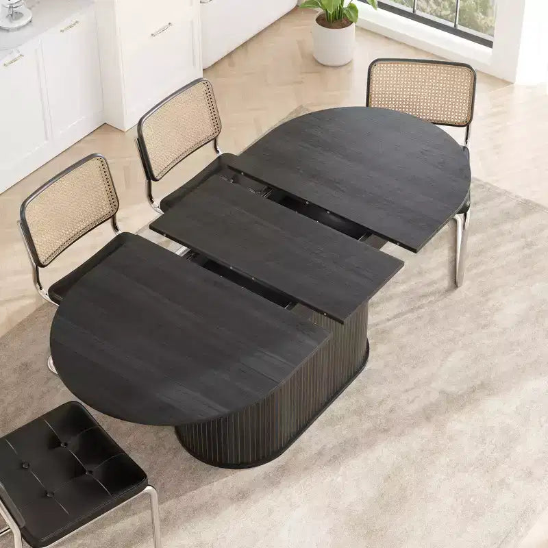 Table à manger ovale extensible noire / naturelle / noyer, piètement central, jusqu'à 6 places