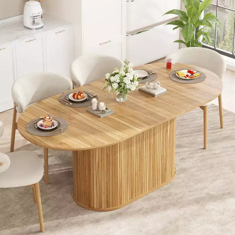 Table à manger ovale extensible noire / naturelle / noyer, piètement central, jusqu'à 6 places