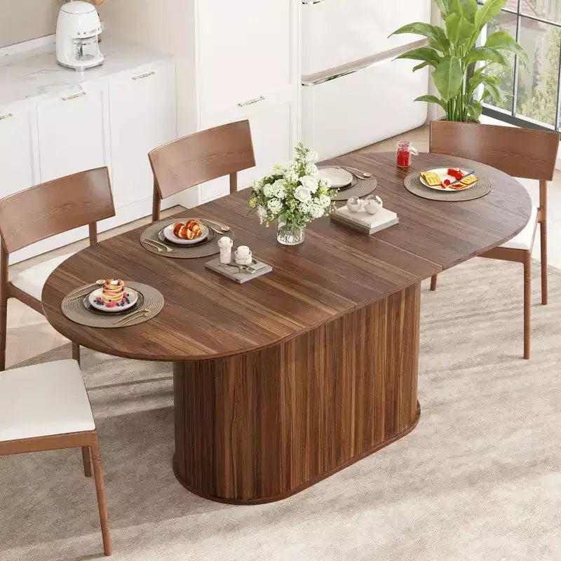 Table à manger ovale extensible noire / naturelle / noyer, piètement central, jusqu'à 6 places