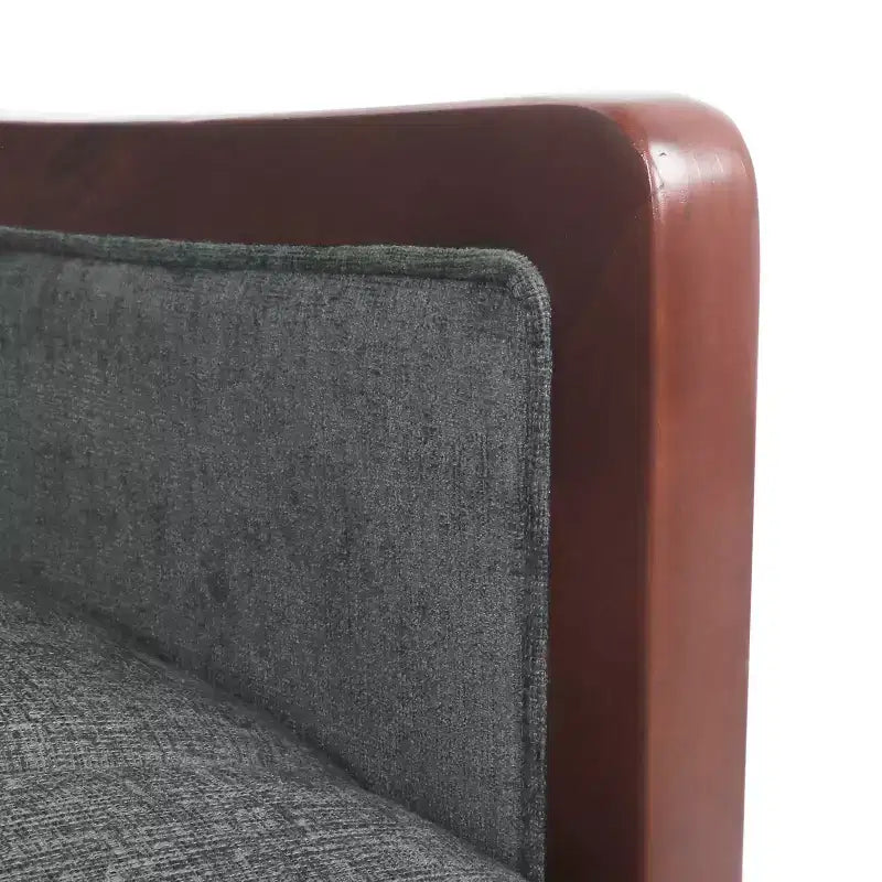 Fauteuil inclinable gris une place avec surpiqûres sur le dossier et les accoudoirs